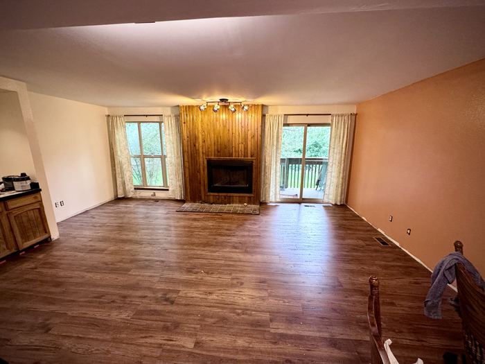 New wood-look laminate flooring installation